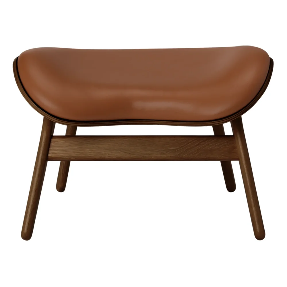 umage, a conversation piece ottoman fotpall dark oak/umage leather cognac