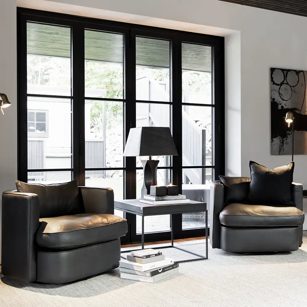 Snurrfåtölj Joan Anthracite leather