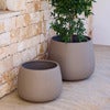 Soil kruka rund mellan Taupe structure, fiberglas